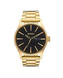 Nixon Sentry herreklokke i gullfarget stål (42mm)