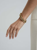Mockberg Aura Bold Bangle armring i gullfarget stål (small)