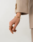 Mockberg Sleek Bangle armring i gullfarget stål (medium)