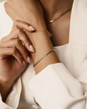 Mockberg Serpentine gullfarget armbånd i stål (medium)